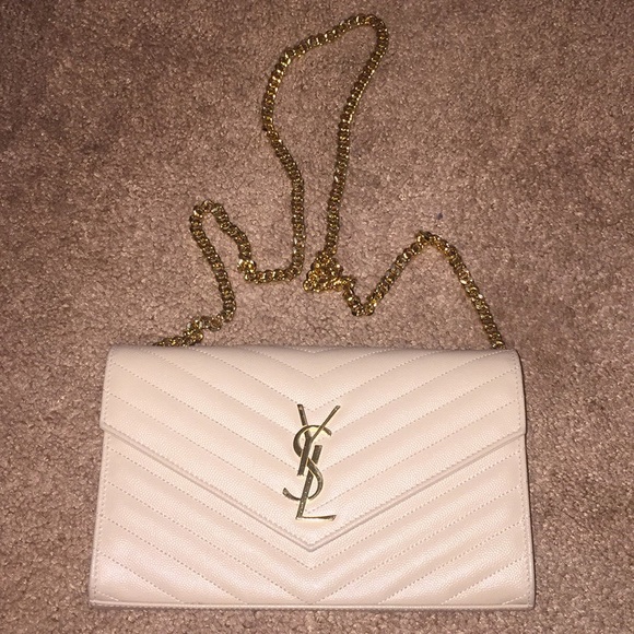 large monogram quilted leather wallet on a chain